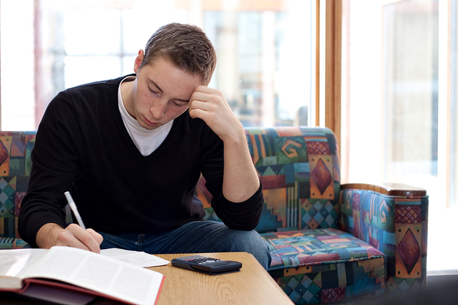 Young Male studying