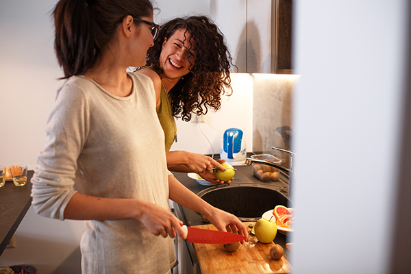Two females cooking