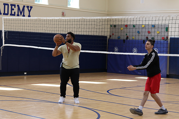 Shooting hoops in the gym