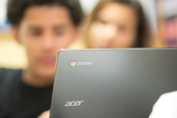 Student with Chromebook