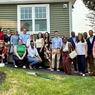 Group of JRI employees, Secretary Tutwiler and Commissioner Kershaw and staff