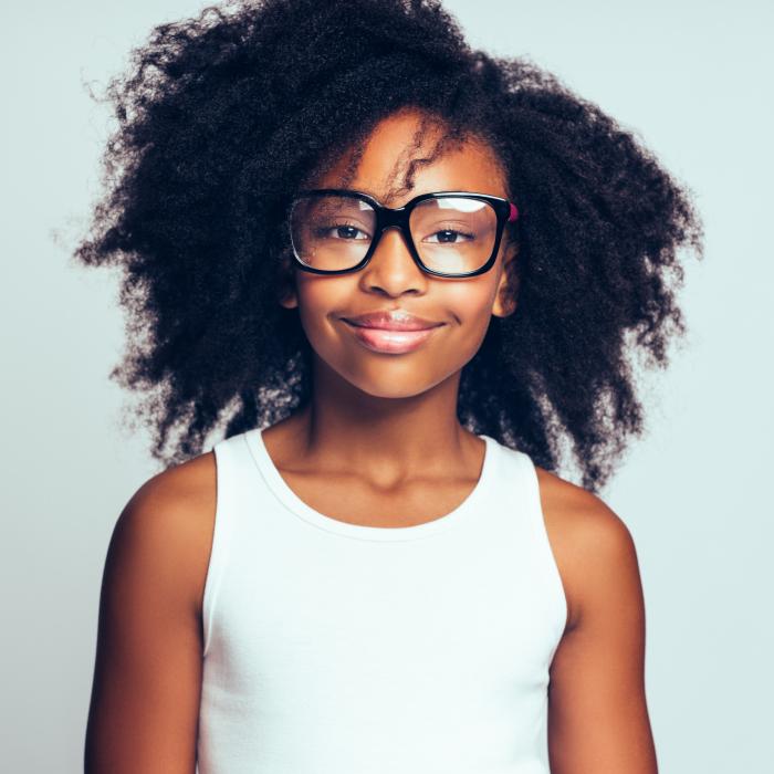African American teen girl with glasses, white background