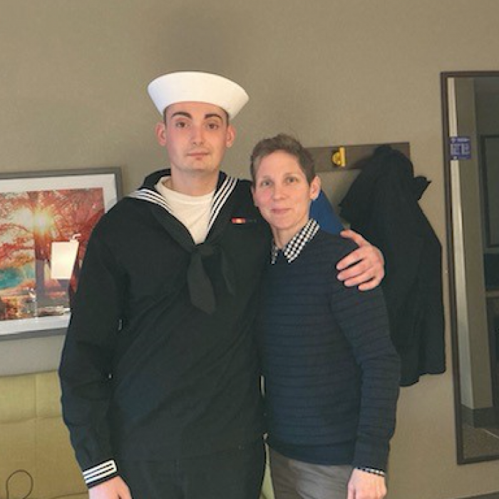 Melanie Burke and Guy in US Navy uniform