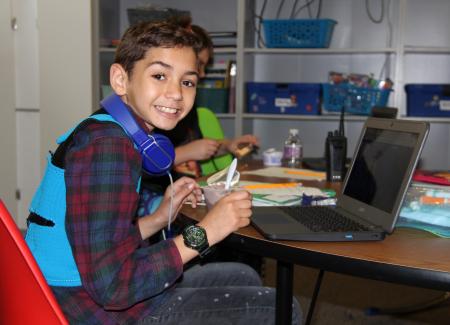 child using laptop