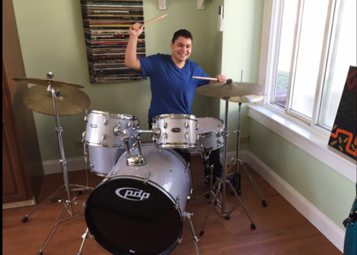 Student Playing Drums