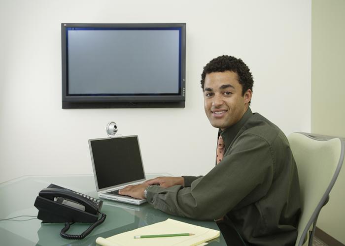 Male in front of computer