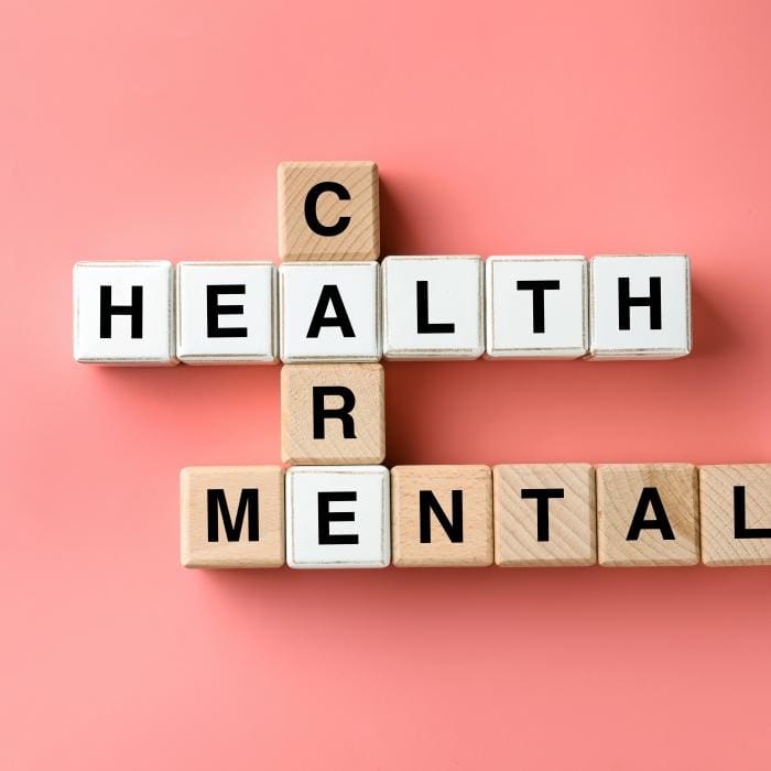 Blocks spelling 'HEALTH', 'MENTAL', and 'CARE'.