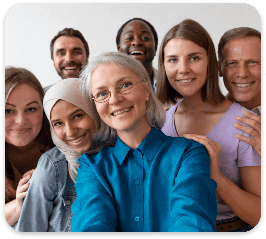 Group of diverse people smiling closely together.