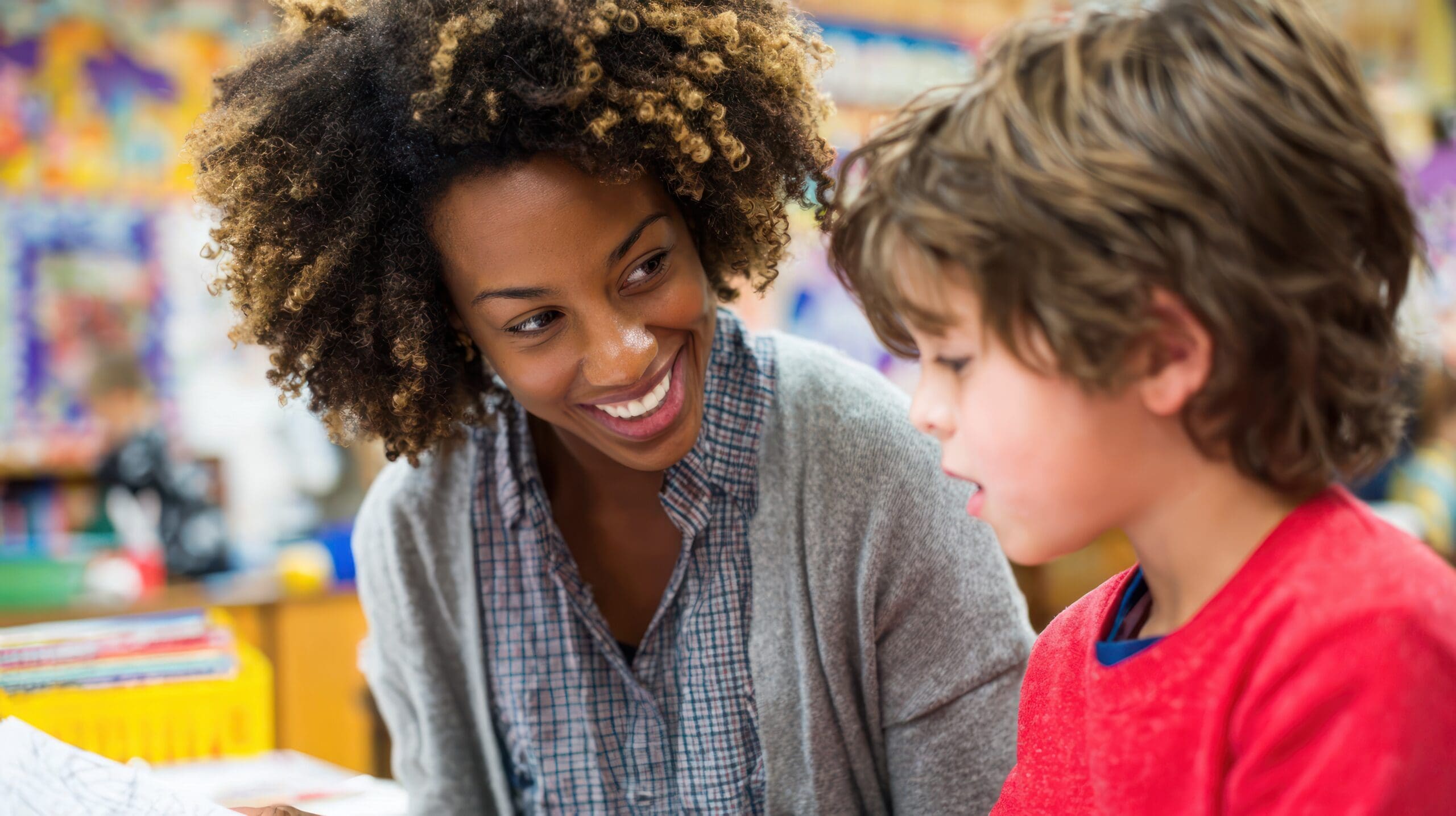 Teacher and child interacting