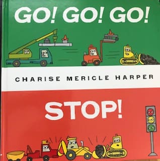 Book cover with colorful cartoon construction vehicles and a traffic light.
